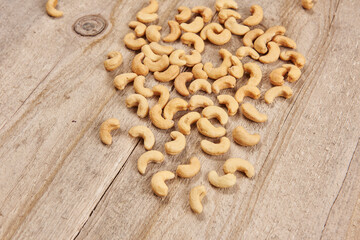 Delicious nuts and dry fruits on the background, close up style, in the plate still life.