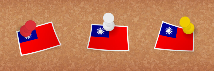 Taiwan flag pinned in cork board, three versions of Taiwan flag.