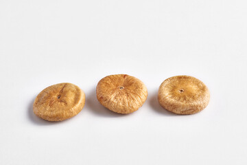 Delicious dry fig and dry fruits on the background, close up style, in the plate still life.