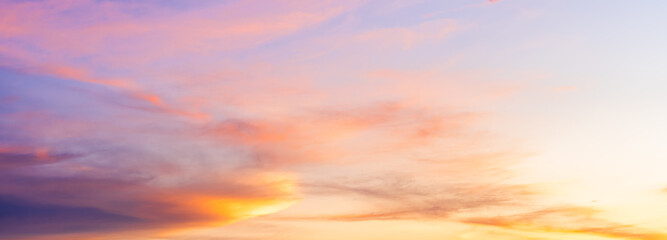 sunset sky background with colorful sunlight in the evening