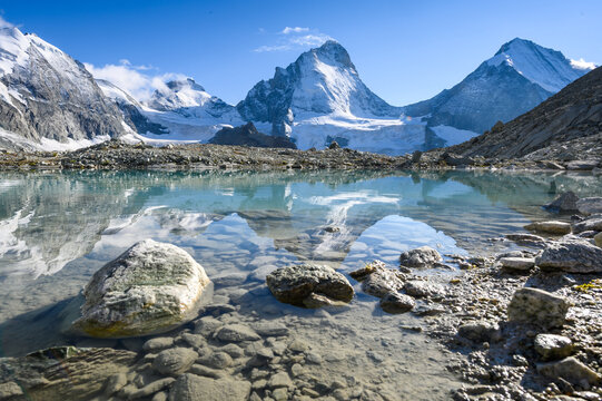 Dent Blanche and reflection in a glacial lake in Val d'Anniviers, Valais