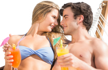 Digital png photo of happy caucasian couple in hammock with drinks on transparent background