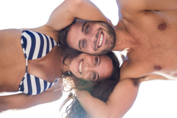 Digital png photo of happy caucasian couple wearing swimsuits on transparent background