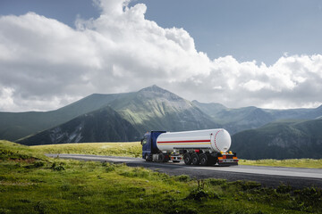 fuel tanker truck on th mountain road - 633362995