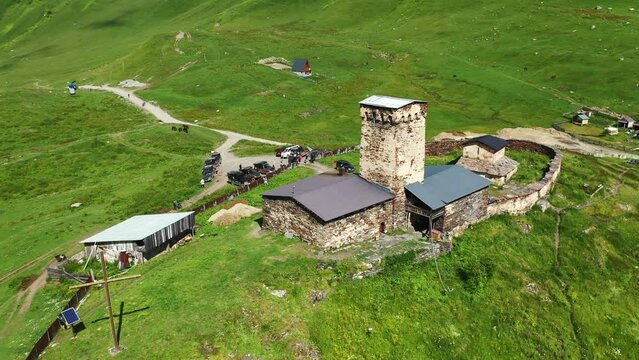 Ushguli church of Mother of God aerial view from drone. Known as Lamaria church of Ushguli - medieval Georgian Orthodox church in Upper Svaneti
