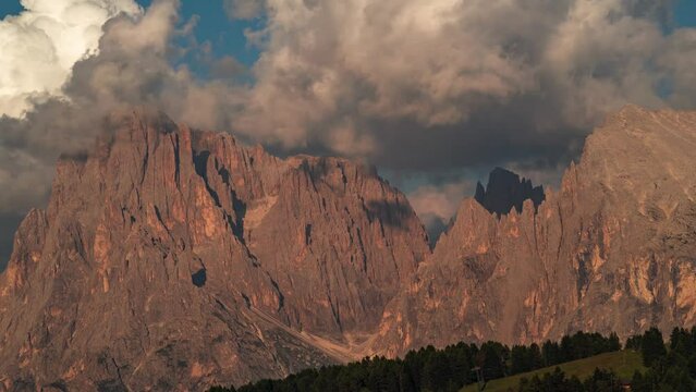 Beautiful sunset timelapse of clouds moving over Dolomites Alpe de Siusi mountain peak. Timelapse in the Dolomites of South Tyrol Italian Alps