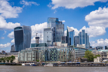 London, UK, 21 june 2023: Under Tower Bridge The City of London Skyline Panoramic skyline Bank Canary Wharf central London leading financial districts skyscrapers River Thames futuristic buildings
