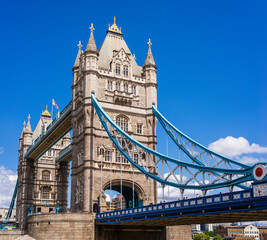 Fototapeta na wymiar Iconic Tower Bridge connecting London with Southwark on the Thames River UK beautiful English symbols Sunny day wallpaper travel