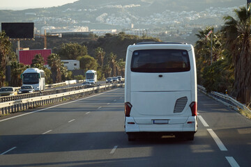 Tourist bus on a highway - back view