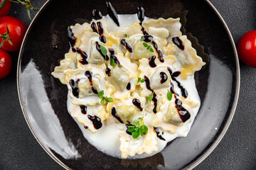 ravioli cream sauce pasta meal food snack on the table copy space food background rustic top view