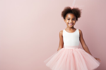 Proud african american little girl on ballet wearing a pink tutu skirt children standing in ballet.