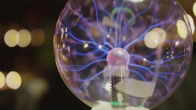 Close up view of crystal ball with blue lightning inside for predicting future