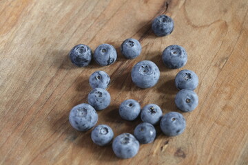 blueberries on wooden background