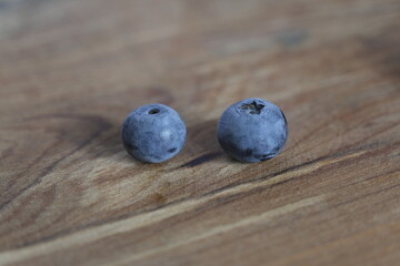 blueberries on wooden background