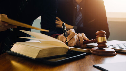 Businessman and Male lawyer or judge consult having team meeting with client, Law and Legal services concept.