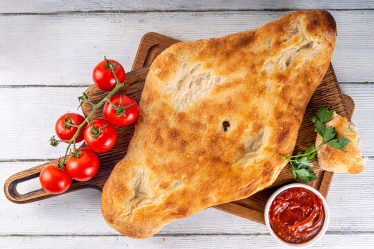 Shotis puri, handmade Georgian bread lavash, local national Caucasian Central Asian food, fresh baked Shoti bread