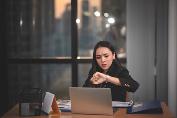 Attractive Asian Businesswoman Working with Computer at Desk, Smiling Business People Happy Working in Office.