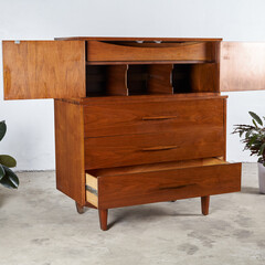 Elegant Mid-Century Modern tall dresser. Vintage 1960s bedroom furniture. 