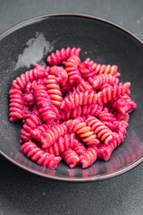 pink pasta beet sauce fusilli vegetable beetroot fresh food meal snack vegetarian food on the table copy space food background rustic top view