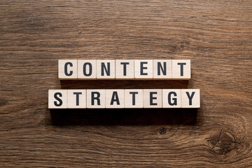 Content strategy - word concept on building blocks, text