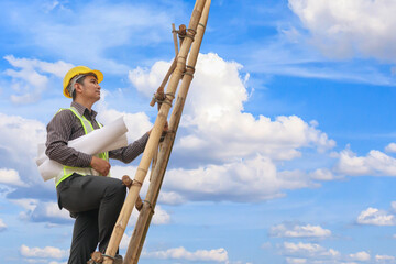 Asian business man engineer climbing up ladder with blue sky, career growth and success concept