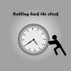 Silhouette of a person pushing a clock, rolling back the time concept