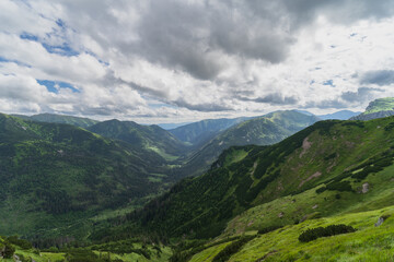 Fototapeta premium Mountain landscape in the Tatras Zakopane in the summer, the sky is covered with clouds.