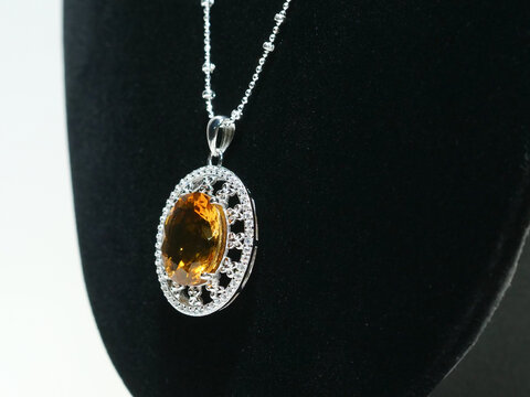 Silver jewelry and gemstone on white background