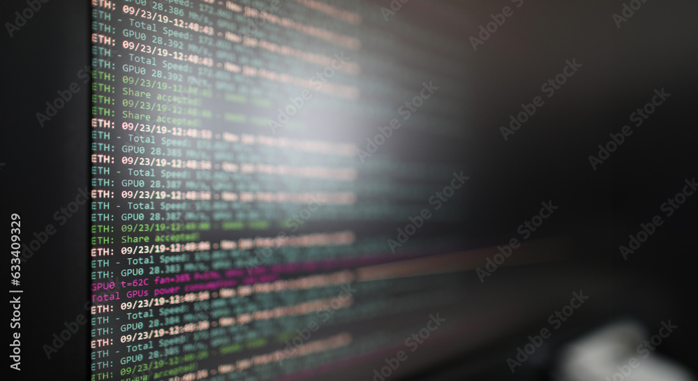 Wall mural program for mining cryptocurrencies on a computer monitor closeup background