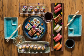 Fotobehang Set of various sushi with wine and chopsticks © ADDICTIVE STOCK CORE