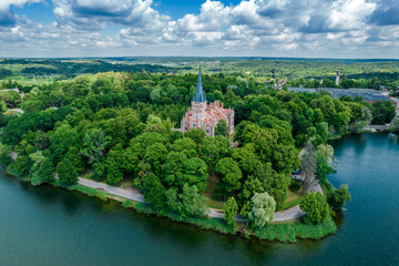 Palace Tyszkiewicz (Tiskeviciai manor) in Lentvaris on the coast of the lake, Lithuania. Aerial...