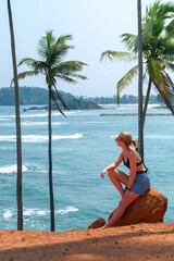 Travel. Retrit travel.Travelers woman coast ocean tropical island.wellness Solitude, wildlife,mental health,conscious travel,travel Travel sea banner,retreat, perspective, deserted beach