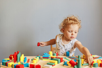 Childhood curiosity and discovery. Playful games for curious minds. Cute creative wavy haired...