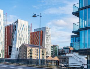 Modern apartment buildings and the Bolands Mills at the Mc Mahon Bridge at the Grand Canal Dock Dublin, Docklands, Dublin, Ireland