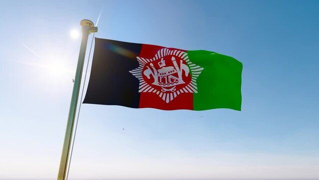 3840x2160. Flag of Afghanistan waving in the wind, sky and sun background. Afghanistan Flag.
