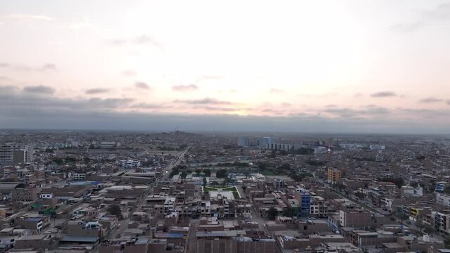 Chiclayo city sunset buildings houses all around the city. Developing city in the north of Peru.