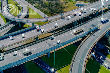 Road junction with cars. Satellite navigation for transport. Road trestle view from quadrocopter....