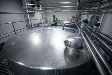 Modern food and drink cellar with stainless steel tanks