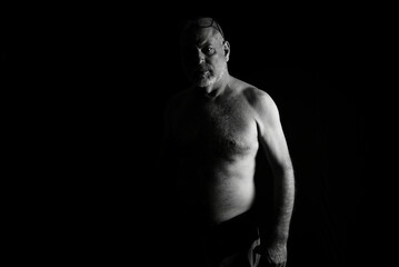 Fototapeta na wymiar body expression body movements man in black and white photo fine art silhouette