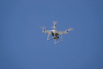 drone , quadcopter flying in the sky