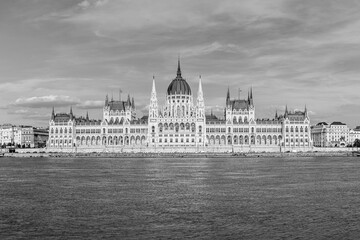 Budapest, Hungary: The Hungarian Parliament Building, seat of the National Assembly of Hungary on the Danube river waterfront in black and white