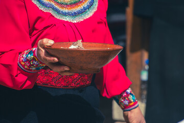 Saraguro culture sharing food at the annual Inti Raymi celebration