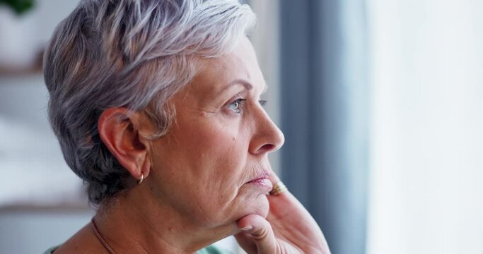 Senior woman, thinking and sad in home with depression, anxiety and serious. Idea, elderly and person with alzheimer, dementia or problem for mental health, remember memory and vision for retirement