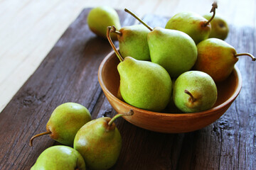 Green pears on a plate