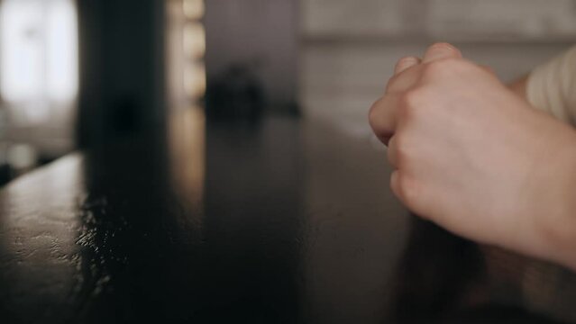 Close up shot of young woman taking off wedding ring, divorce concept, female hands holding engagement ring, cheated girl break up with boyfriend or husband