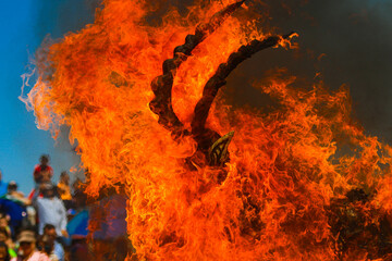 Burning of masks on Saturday of glory of Holy Week celebrated by the Yaqui community or tribe in Hermosillo Mexico on April 15, 2017. masks with strange shapes or demons burn the flames or fire.