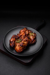 Delicious baked chicken meat with salt, spices and herbs