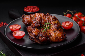 Delicious baked chicken meat with salt, spices and herbs
