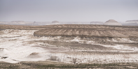 Panorama of the layered ridges and slopes of the Ustyurt plateau in Mangistau, the panorama of the Kazakh desert