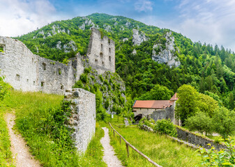 A view from the base of the Stone Castle ruins on the outskirts of the town of Begunje na...